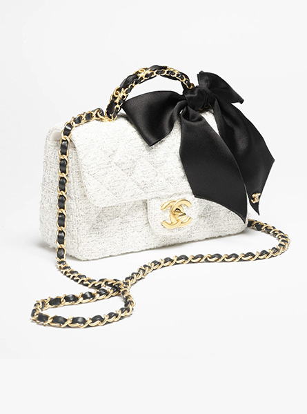 高仿CHANEL包包 | A货香奈儿女包 2025/26秋冬系列 白色迷你口盖包配以手柄